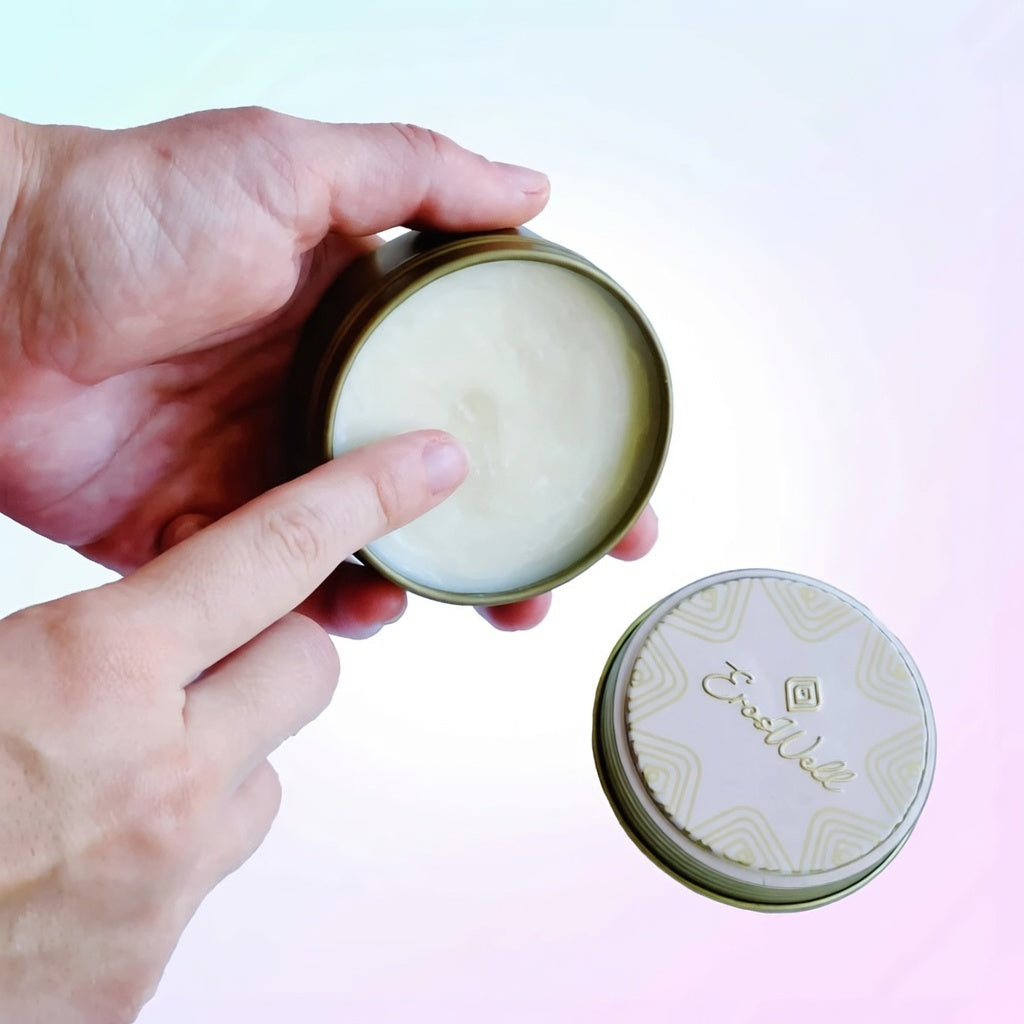ErosWell Bomb Balm arousal balm being applied from jar