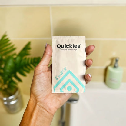 ErosWell Quickies intimate wipes individually wrapped wipes held in hand