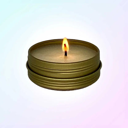 ErosWell ThreePlay massage candle burning with relaxing glow